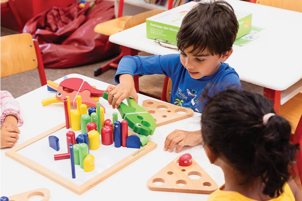 Images shows children attending the Vorschule (primary school) at the DSJ